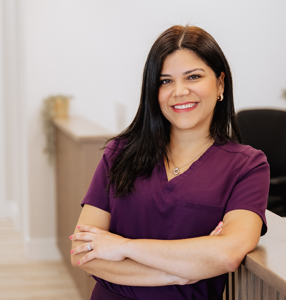 Professional photo of Dr. Eiryn Cormier smiling